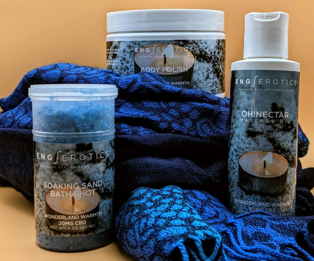 Wonderland Warmth CBD products with blue cloth