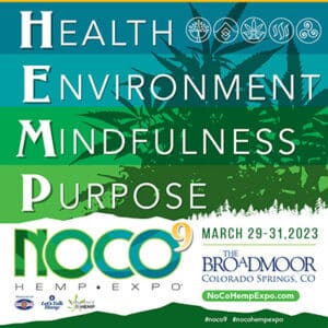 NoCo9-IG-HEMPacronym-400-300x300 Wonderland Warmth in a body polish container with a candle on a blue label
